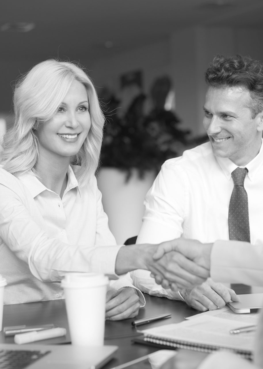 Meeting with Client, Sitting at a desk across from each other